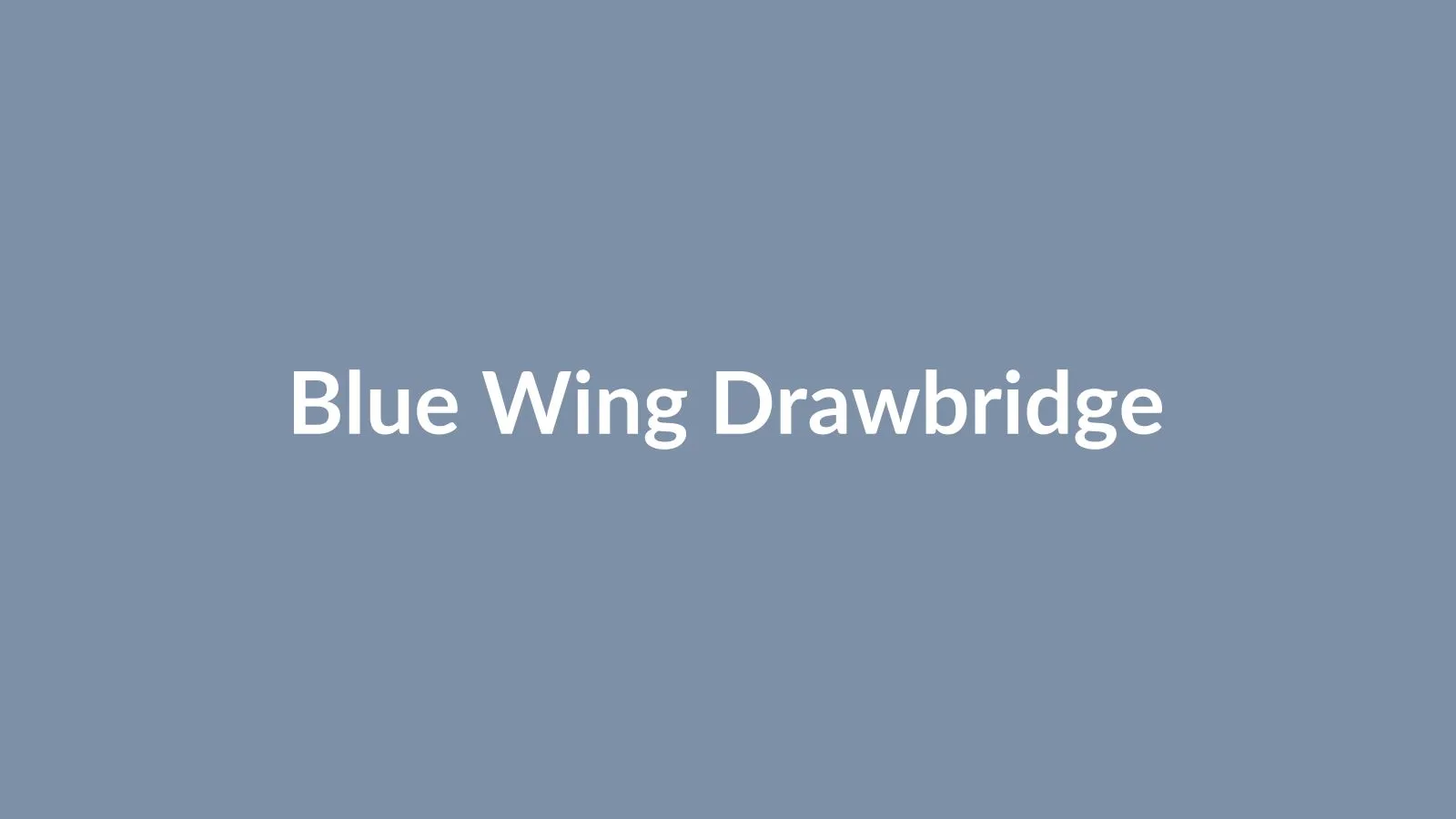 The Blue Wing Mojiko drawbridge raised open to allow a vessel through, with the harbor behind