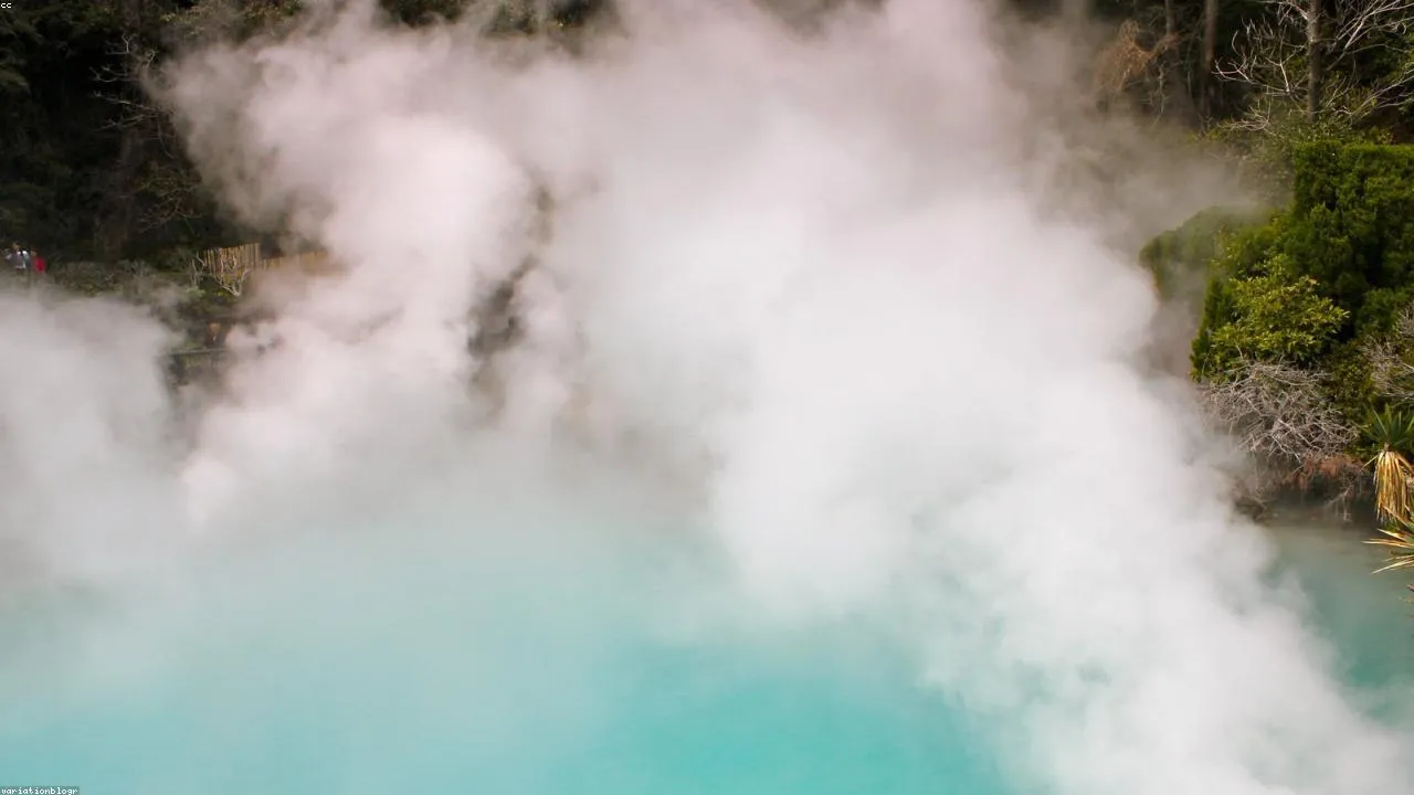 Beppu Hells steaming blue water at Umi Jigoku — the Sea Hell